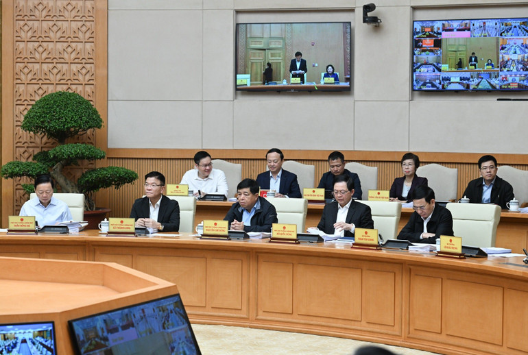 Các thành viên Chính phủ, các đại biểu tham dự phiên họp. (Ảnh: TRẦN HẢI)