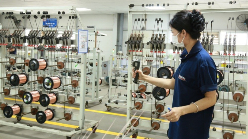 Lao động của Công ty TNHH Thành Đồng (Cụm công nghiệp Dốc Sặt, Từ Sơn, Bắc Ninh) trong dây chuyền sản xuất. (Ảnh nhandan.vn)