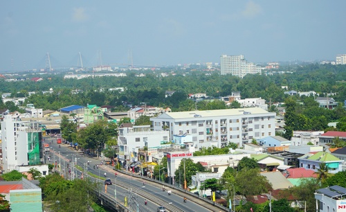 Các chương trình hợp tác song phương giữa TP Hồ Chí Minh và Vĩnh Long đã và đang góp phần thúc đẩy phát triển kinh tế- xã hội của các địa phương. Trong ảnh: Một góc TP Vĩnh Long.
