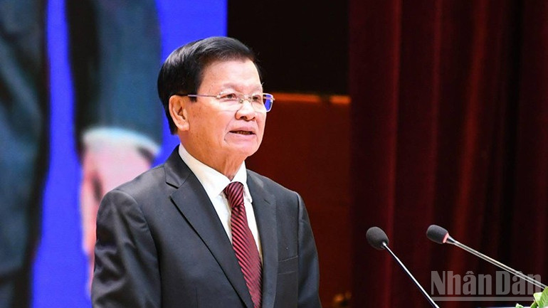 Tổng Bí thư, Chủ tịch nước Lào Thongloun Sisoulith đọc diễn văn tại buổi lễ. (Ảnh: DUY TOÀN)