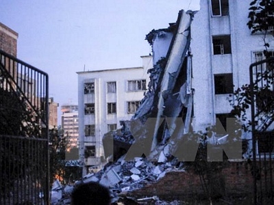 Một phần tòa nhà bị sập sau vụ nổ ở huyện Liễu Thành ngày 30/9. (Reuters/TTXVN)