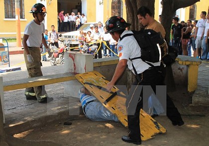 Ngày 11/3, các tay súng đi xe máy nã súng vào 3 phóng viên tại thành phố Mazatenango, Guatemala,  làm 2 người thiệt mạng và 1 người bị thương. (Nguồn: AFP/TTXVN)