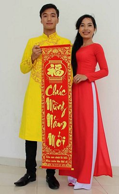 Chị Trần Thị Hoàng Mỹ cho rằng mặc áo dài là gìn giữ văn hóa dân tộc.