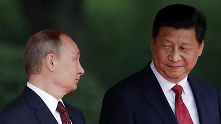 Tổng thống Nga Vladimir Putin và chủ tịch Trung Quốc Tập Cận Bình. (ảnh: Reuters). 