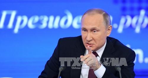 Tổng thống Putin phát biểu tại cuộc họp báo cuối năm. Ảnh: AFP/TTXVN