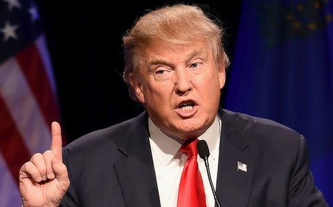 Tổng thống Donald Trump quyết bảo vệ đến cùng chính sách cứng rắn chống lại người nhập cư trái phép của mình. Ảnh: AP