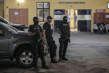Cảnh sát Malaysia bảo vệ nơi để thi thể ông Kim Jong Nam (Nguồn: EPA)