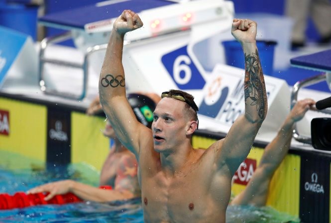 Dressel ăn mừng với kỳ tích ở giải vô địch thế giới. Ảnh: REUTERS