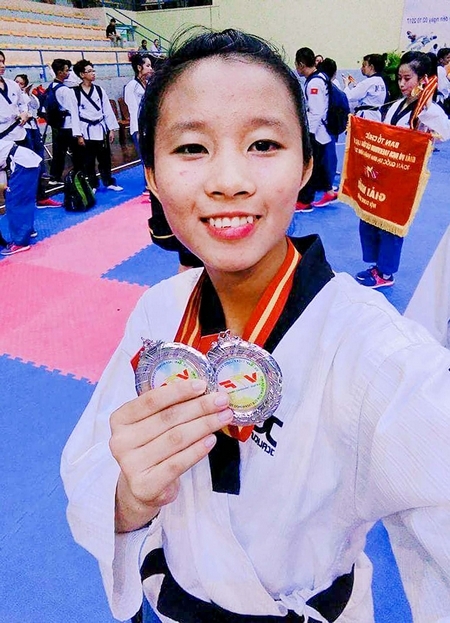 VĐV Nguyễn Phan Khánh Hân giành 2 HCB nội dung quyền. Ảnh: KIM ĐỒNG