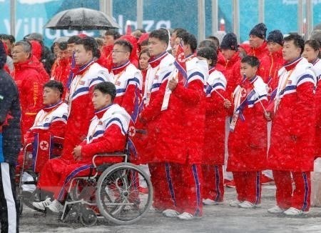 Phái đoàn Triều Tiên đến tham dự Paralympic mùa Đông 2018 tại lễ đón ở làng vận động viên ở PyeongChang, Hàn Quốc ngày 8/3. (Nguồn: Kyodo/TTXVN)