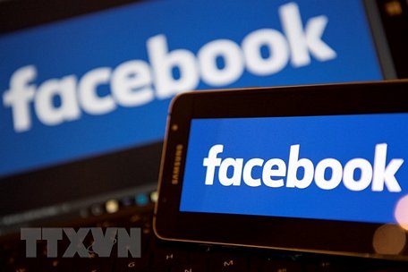 Biểu tượng Facebook tại London, Anh. (Nguồn: AFP/TTXVN)