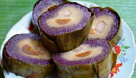  Bánh tét lá cẩm là đặc sản của xứ gạo trắng nước trong. Ảnh: Foody