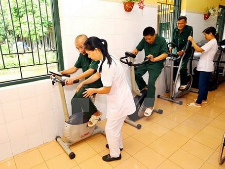Chăm sóc phục hồi chức năng cho các thương binh nặng, người có công với cách mạng. (Ảnh: PV/Vietnam+)