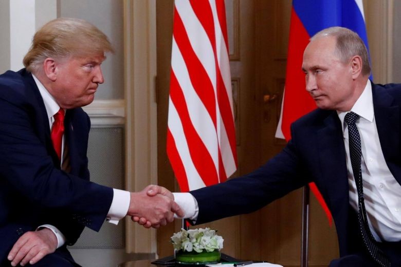 Tổng thống Nga Vladimir Putin và người đồng cấp Mỹ Donald Trump. Ảnh: REUTERS