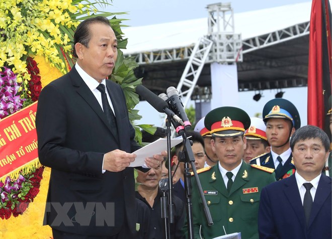  Đồng chí Trương Hòa Bình, Ủy viên Bộ Chính trị, Phó Thủ tướng thường trực Chính phủ, Trưởng Ban Tổ chức Lễ tang phát biểu cảm ơn và tuyên bố kết thúc Lễ Quốc tang Chủ tịch nước Trần Đại Quang. (Ảnh: Nhan Sáng/TTXVN)