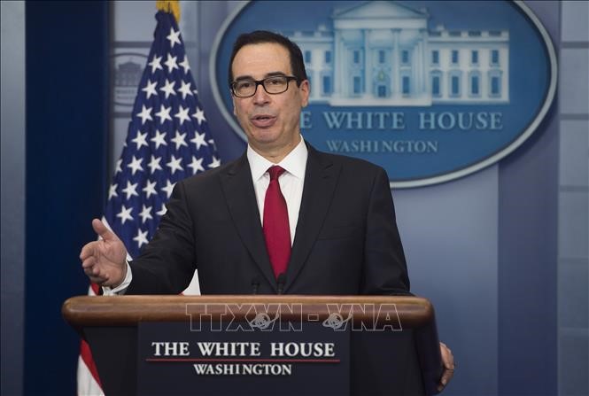 Bộ trưởng Tài chính Mỹ Steven Mnuchin trong cuộc họp báo tại Washington DC. Ảnh: AFP/TTXVN