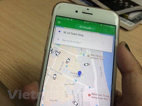 Ứng dụng gọi xe taxi công nghệ của Grab. (Nguồn: Vietnam+)