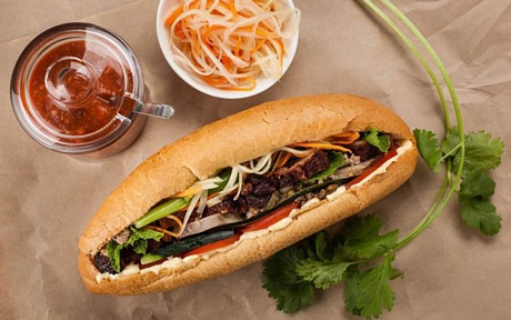 Bánh mì là một món ăn dân dã tại Việt Nam. Đây được đánh giá là một trong món ăn mà du khách phải thử khi tới Việt Nam, đặc biệt tại các thành phố lớn như Hà Nội, Hồ Chí Minh hay phố cổ Hội An. Món bánh mì giòn rụm bên ngoài, mềm và mọng nước bên trong, ăn với thịt lợn, các loại rau sống, chả, xúc xích, pate và nhiều nguyên liệu khác gia giảm tùy theo mỗi vùng miền. Theo bảng xếp hạng từ website du lịch uy tín traveller.com.au của nước Úc, cùng với nhiều món sandwich khác, bánh mì Việt Nam được nhiều du khách cực kỳ yêu thích và có tên trong bảng xếp hạng 10 món sandwich ngon nhất thế giới.