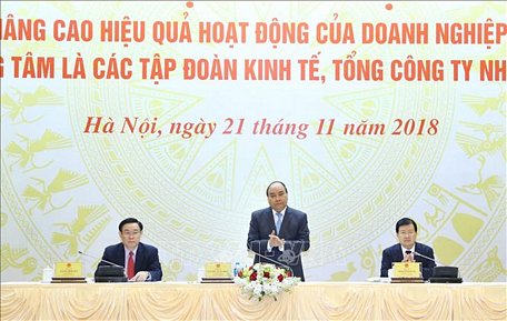 Thủ tướng Nguyễn Xuân Phúc và các Phó Thủ tướng Vương Đình Huệ, Trịnh Đình Dũng dự hội nghị. Ảnh: Thống Nhất/TTXVN