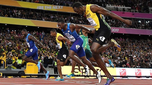  Ai sẽ thay thế Usain Bolt (bìa phải) để trở thành người chạy nhanh nhất thế giới? - Ảnh: Getty Images