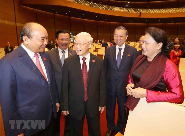  Tổng Bí thư, Chủ tich nước Nguyễn Phú Trọng, Thủ tướng Nguyễn Xuân Phúc, Chủ tịch Quốc hội Nguyễn Thị Kim Ngân và các đại biểu dự kỳ họp. (Ảnh: Trí Dũng/TTXVN)