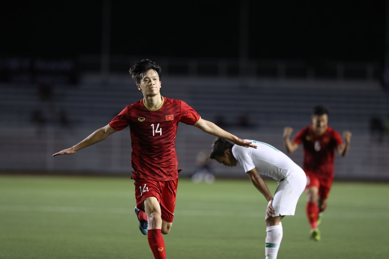 Tiền vệ Hoàng Đức ăn mừng sau khi ghi bàn nâng tỷ số lên 2 - 1 cho U22 Việt Nam. Ảnh: Hoàng Linh/TTXVN