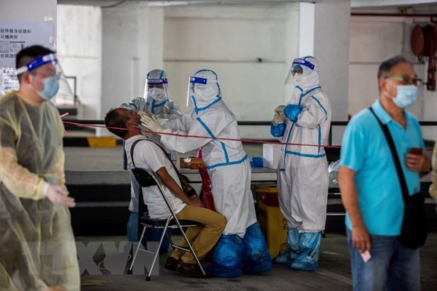 Một điểm xét nghiệm COVID-19 tại Hong Kong, Trung Quốc ngày 19/7/2020. (Ảnh: AFP/TTXVN)