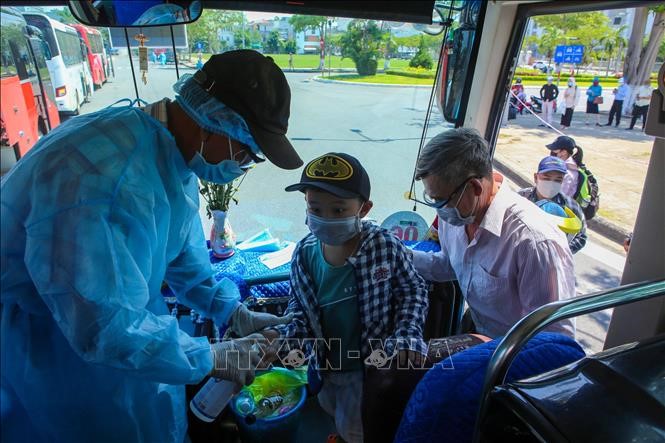 Thực hiện các biện pháp phòng dịch COVID-19. Ảnh: TTXVN