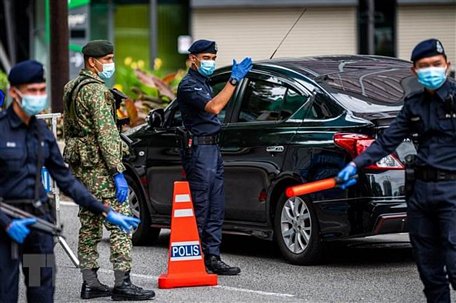 Một trạm kiểm soát tại Kuala Lumpur, ngày 13/1/2021, sau khi Malaysia tái ban bố Lệnh hạn chế di chuyển (MCO). (Ảnh: THX/TTXVN)