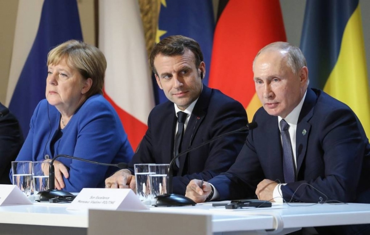 Thủ tướng Đức A.Merkel, Tổng thống Pháp E.Macron và Tổng thống Nga V.Putin. (Ảnh: EPA-EFE)