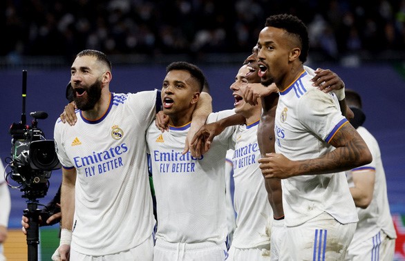 Real Madrid giành vé vào tứ kết Champions League sau khi hạ PSG - Ảnh: REUTERS