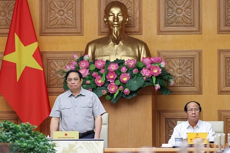  Thủ tướng Chính phủ Phạm Minh Chính, Phó Thủ tướng Lê Văn Thành, Trưởng Ban Chỉ đạo Trung ương về phòng chống thiên tai, chủ trì cuộc họp khẩn ứng phó với bão số 4 sáng 27/9 - Ảnh: VGP/Nhật Bắc