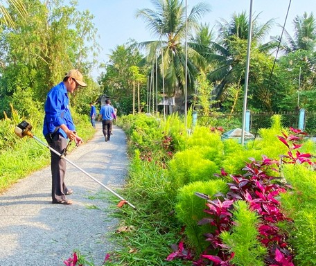 Các địa phương đang tập trung dọn dẹp cảnh quan để nâng chất tiêu chí môi trường trong xây dựng NTM.