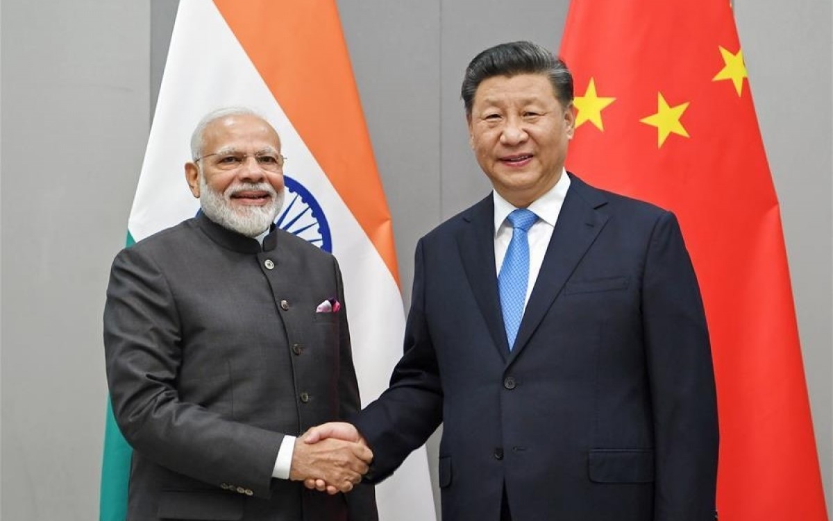 Thủ tướng Ấn Độ Narendra Modi (trái) và Chủ tịch Trung Quốc Tập Cận Bình. Ảnh: Tân Hoa xã.